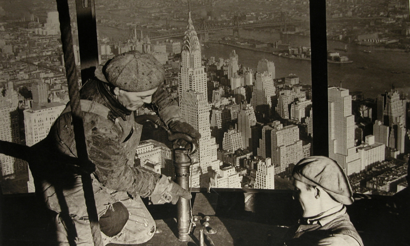 Lewis Hine's photograph titled 'Topping the mast, Empire State Building'.