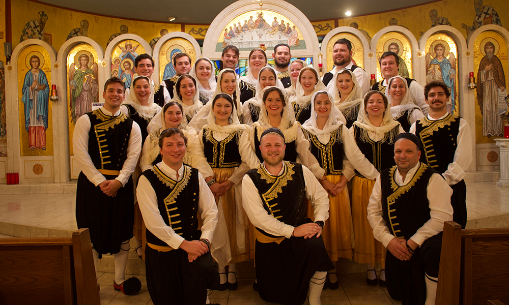 a group of dancers all wearing traditional greek clothing