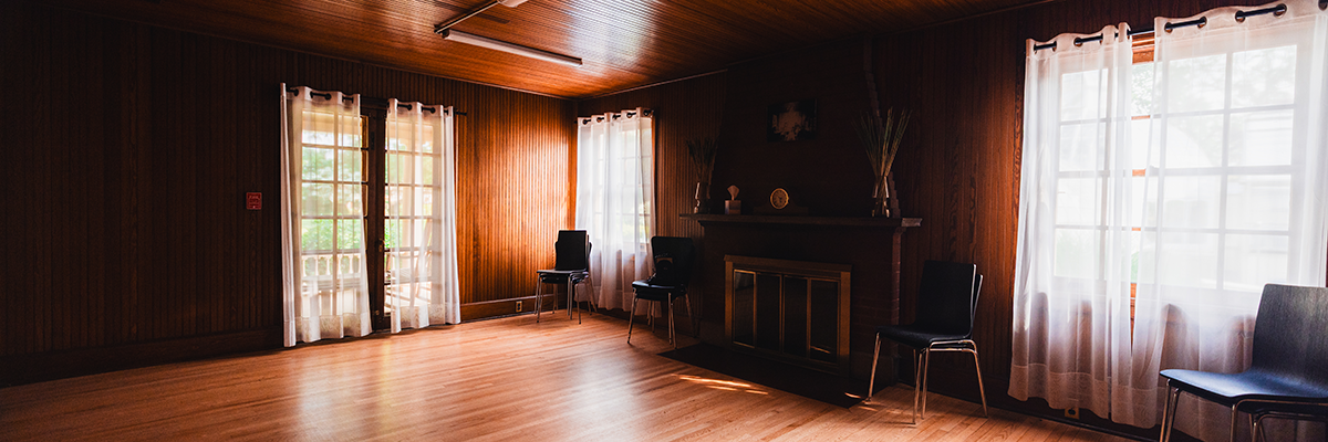 an empty wood-paneled room