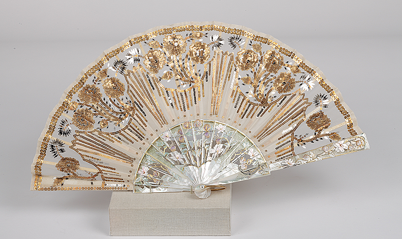 Fan, Circa 1880-1910. Lace, Mother of Pearl, Sequins, Wood, Silk, 8 1/2 x 16 1/4 in. (21.6 x 41.3 cm). The Frick Pittsburgh.